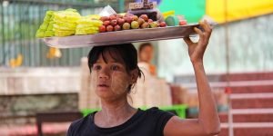a-young-vendor-at-yangon-local-market