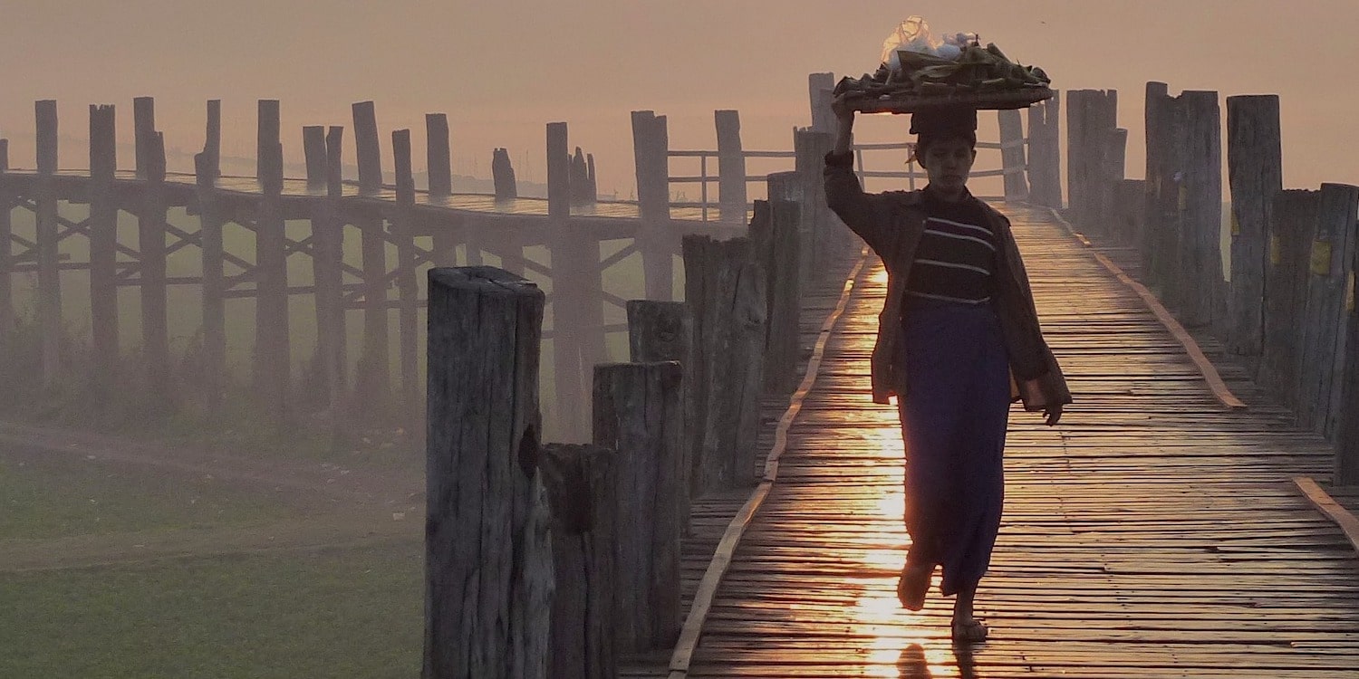 1500px x 750px - a local woman walking on u bein bridge - Gatsby