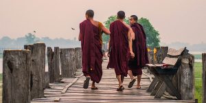 young-monks-walking-on-u-bein-bridge-in-amarapura-in-mandalay