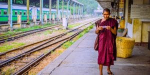 a-local-monk-on-the-platform-of-yangon-train